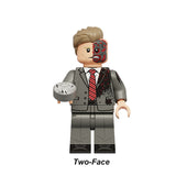 Two-Face Harvey Dent custom brick minifigure featuring his signature split suit.