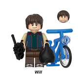 Will Byers custom building block toy, Lego-compatible minifigure with blue bike and backpack.